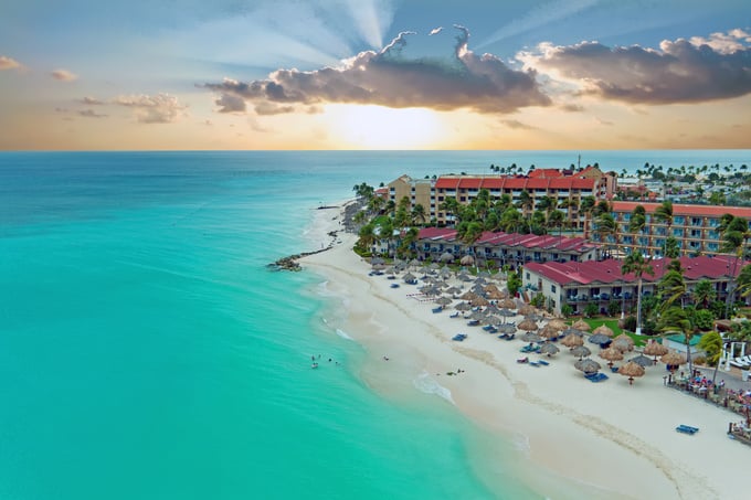 Aerial from Manchebo beach on Aruba island in the Caribbean at sunset